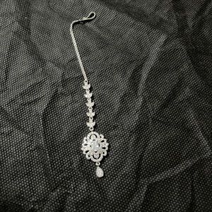 1 carat gold , forehead pin.